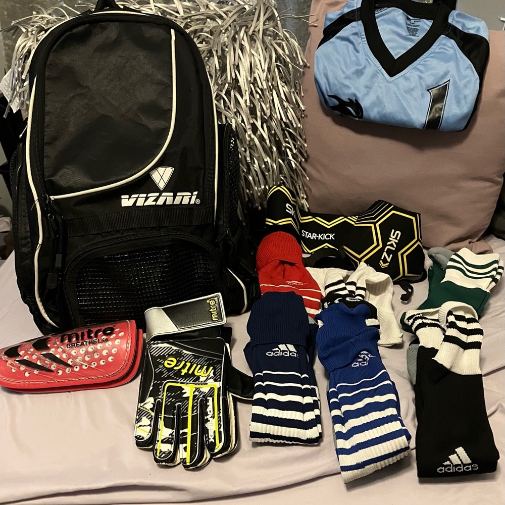 Lot of boys soccer stuff